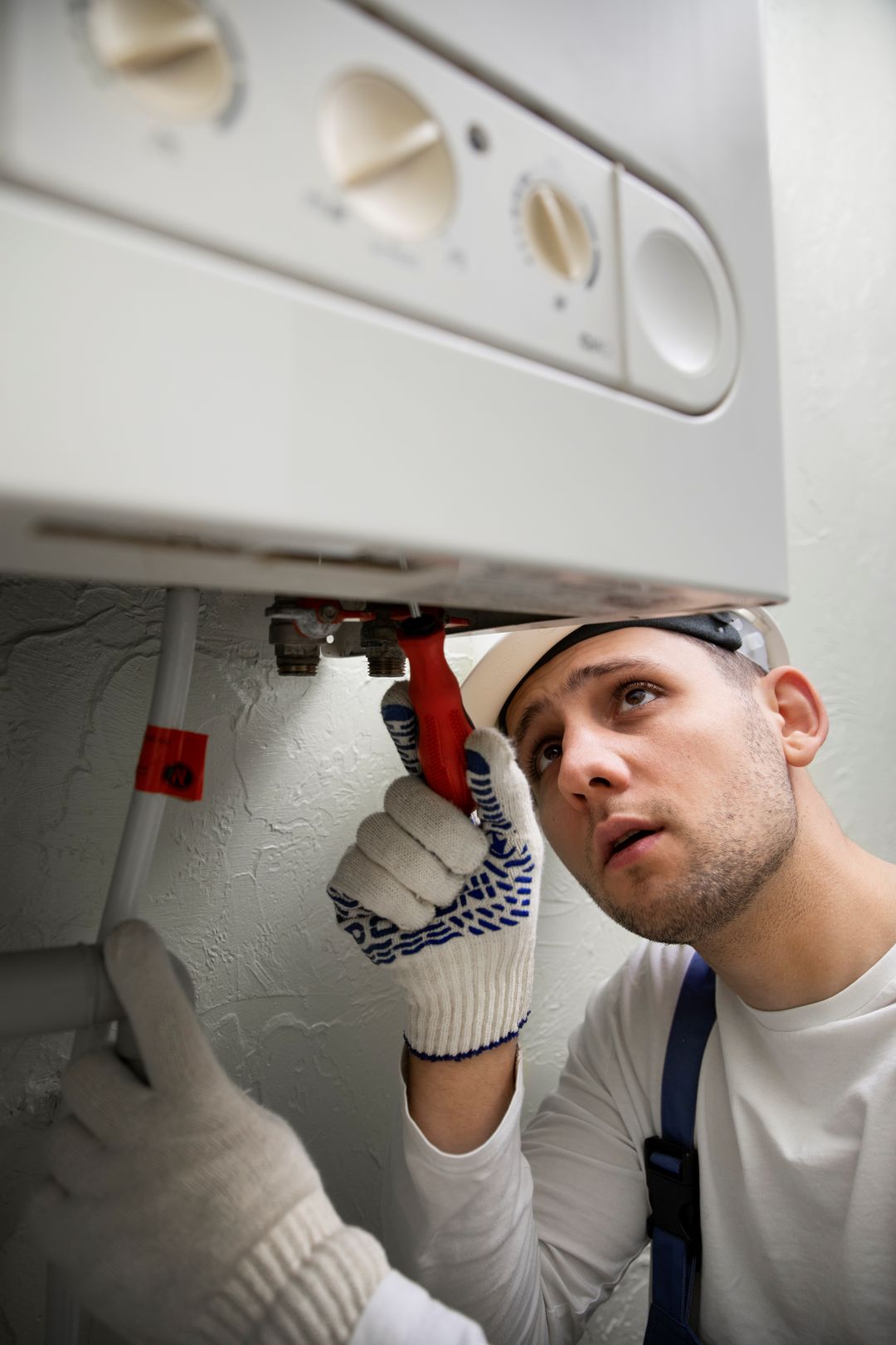 Plumber repairing hot water problems
